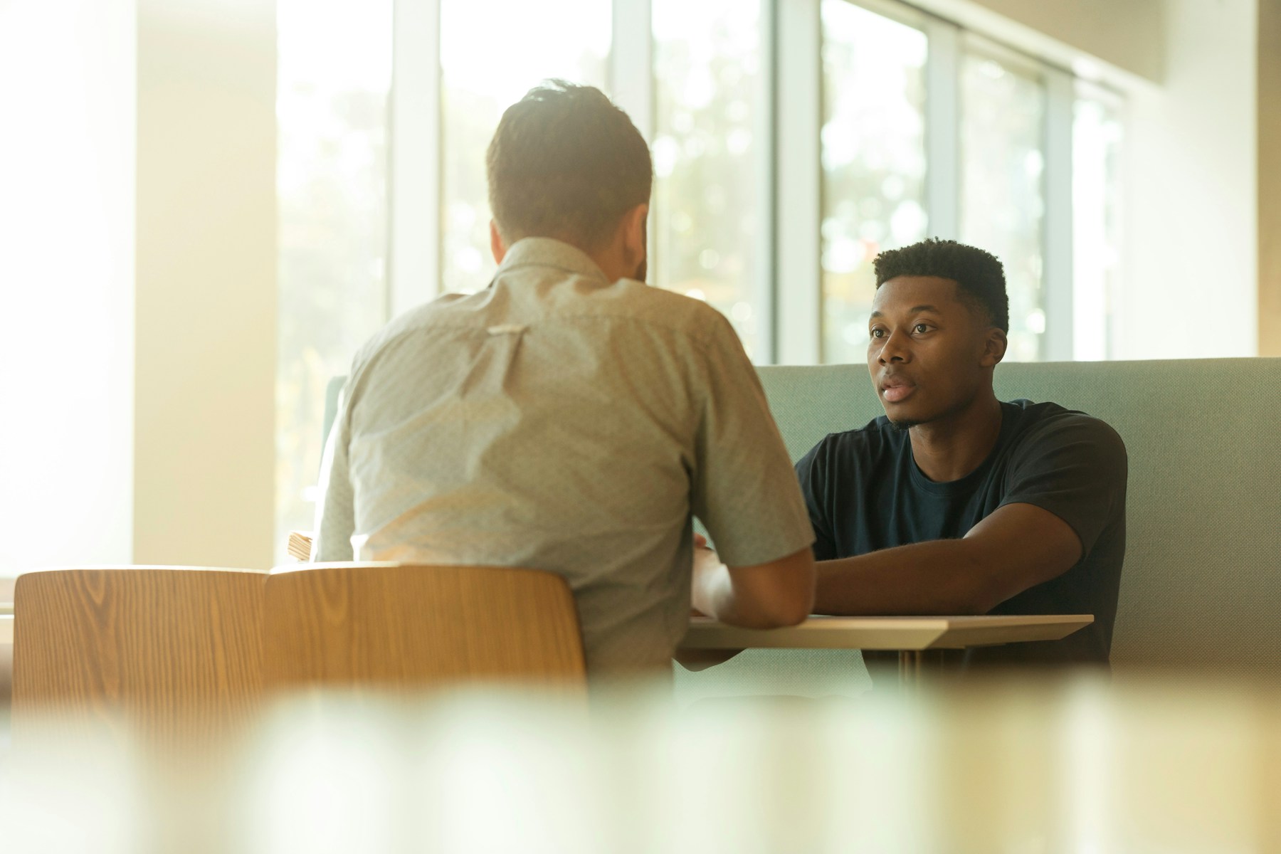 Two people having a supportive conversation