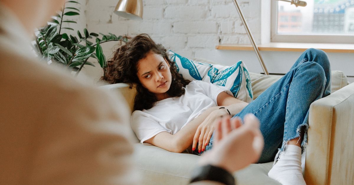 Young person speaking with a therapist